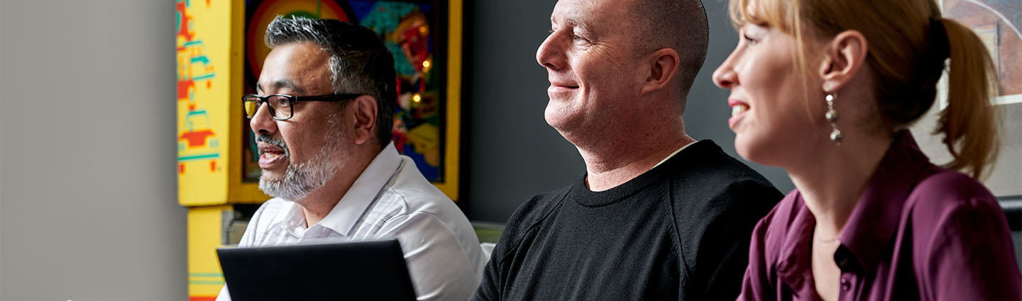 Various people planning a blog strategy